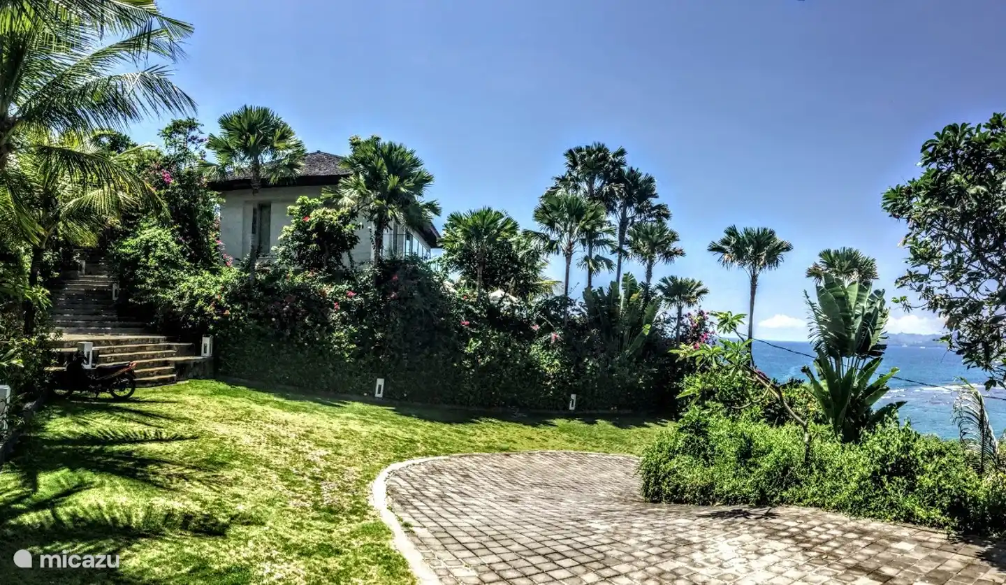 The driveway with parking space