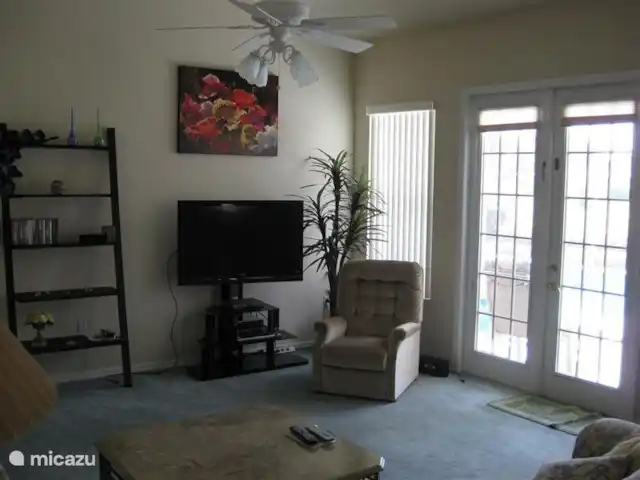 villa huren in Verenigde Staten, Florida, Spring Hill – Villa met zwembad in Spring Hill Vanuit de woonkamer is de toegang tot het grote terras met zwembad