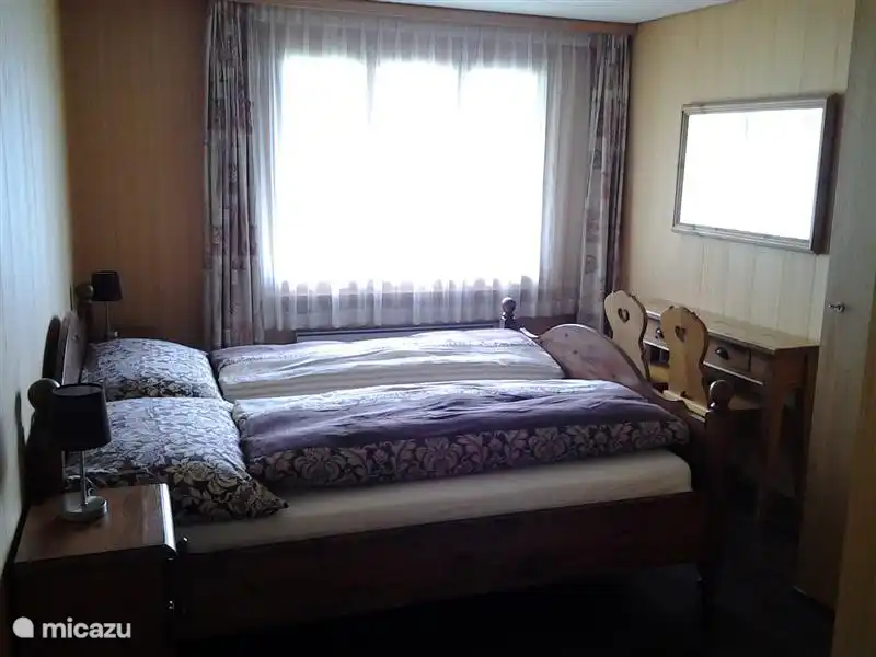 The large master bedroom with dressing table and a large double bed with slatted base and two separate, good mattresses, 1.80 m. wide, 2.00 m. long