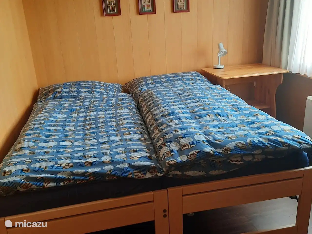 The second bedroom has two single beds, one of which is a trundle bed. Both are full beds with excellent mattresses and slatted bases.