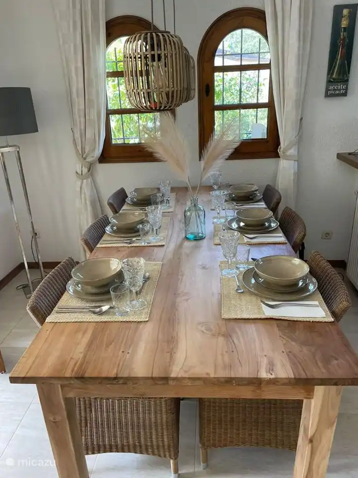 Dining table with six chairs.