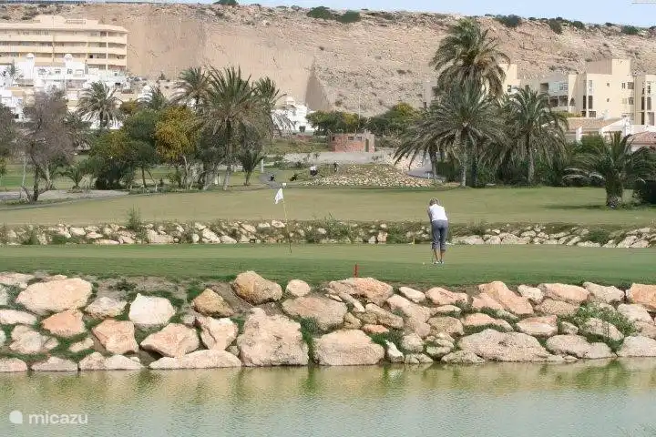 Playing golf in the winter months under the Spanish sun.