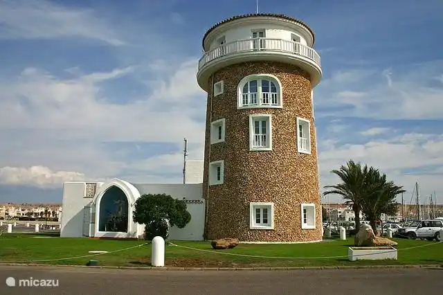 The well-known tower at the entrance of the marina.