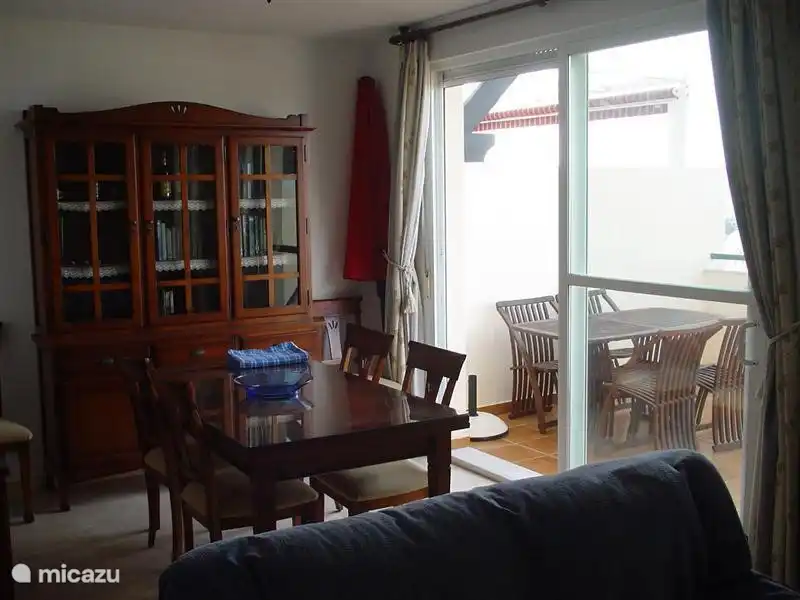 Living room with large sliding glass doors to the terrace facing south.