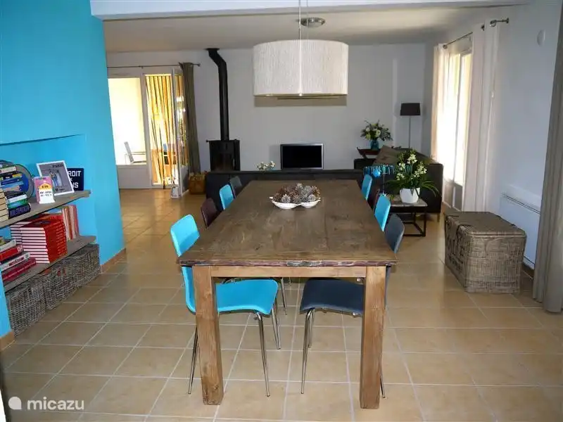 Large wooden dining table with 8 dining chairs