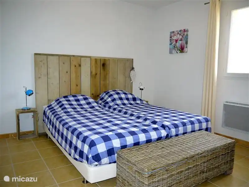 1 of 4 bedrooms with 2 1-person beds (2 meters long) and 4-season duvets