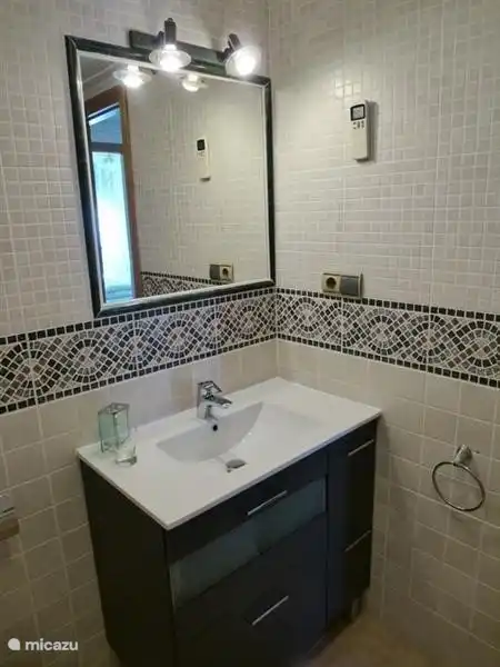 Bathroom with bath upstairs