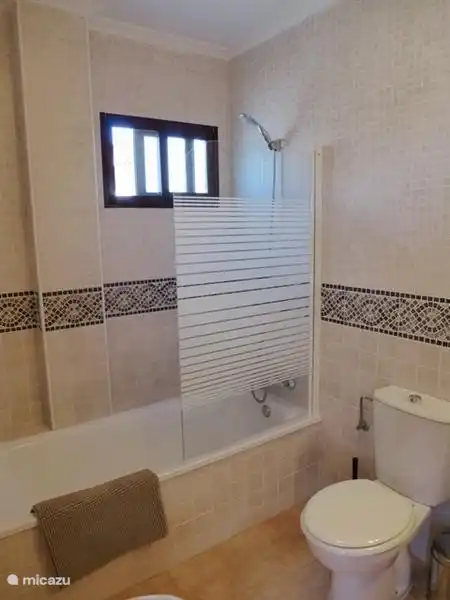 Bathroom with bath upstairs