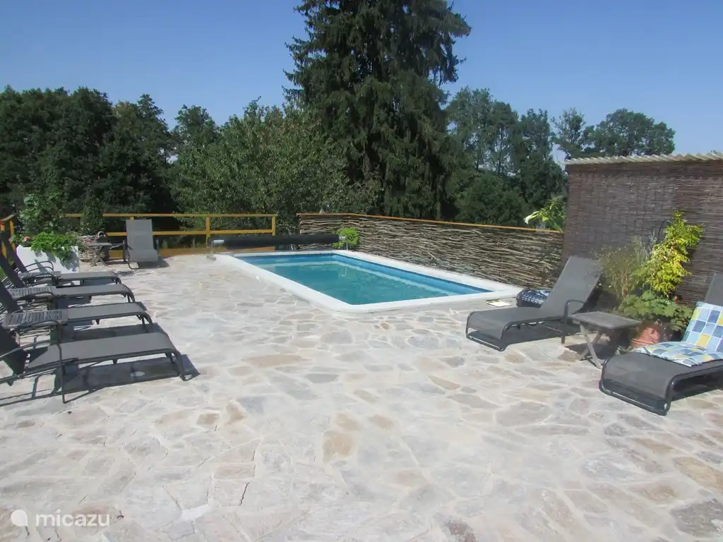 Our pool is heated, with jet stream and sun beds.