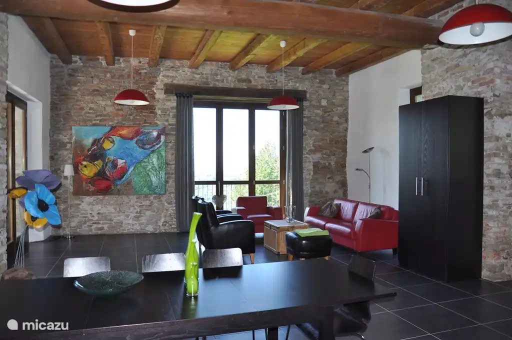 Ground floor living room, dining area and lounge with open kitchen. Adjacent 2 bedrooms.