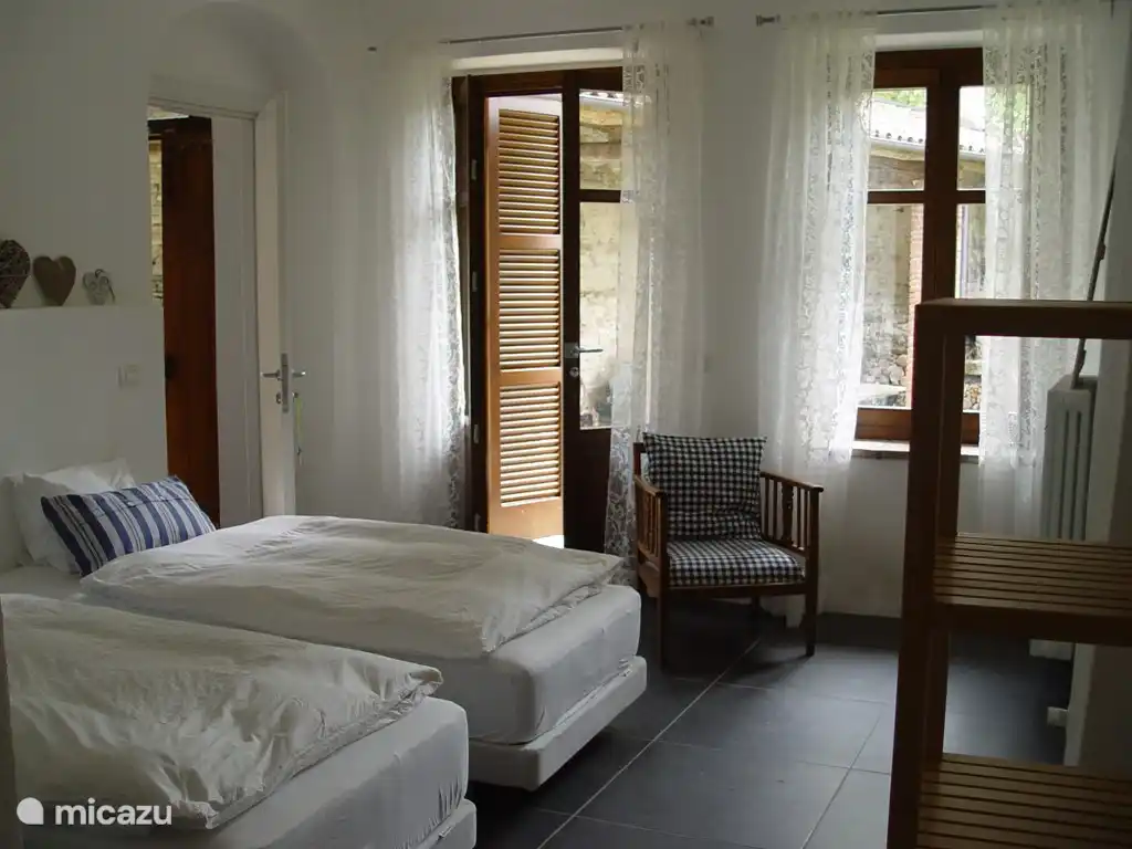 All bedrooms are bright white with 2 single divan beds. Second, all bedrooms have private bathrooms. Most bedrooms have sliding doors and a seat.