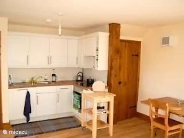 vakantiehuis huren in Groot-Brittannië, Cumbria, Nenthead – Cotterill Barn De andere hoek van de woonkamer, de keuken.