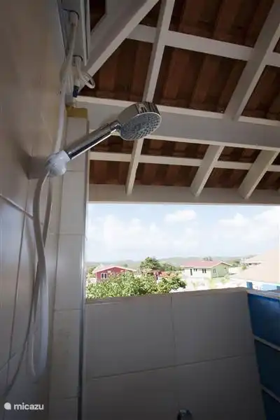 Outdoor shower from which you can see the sea