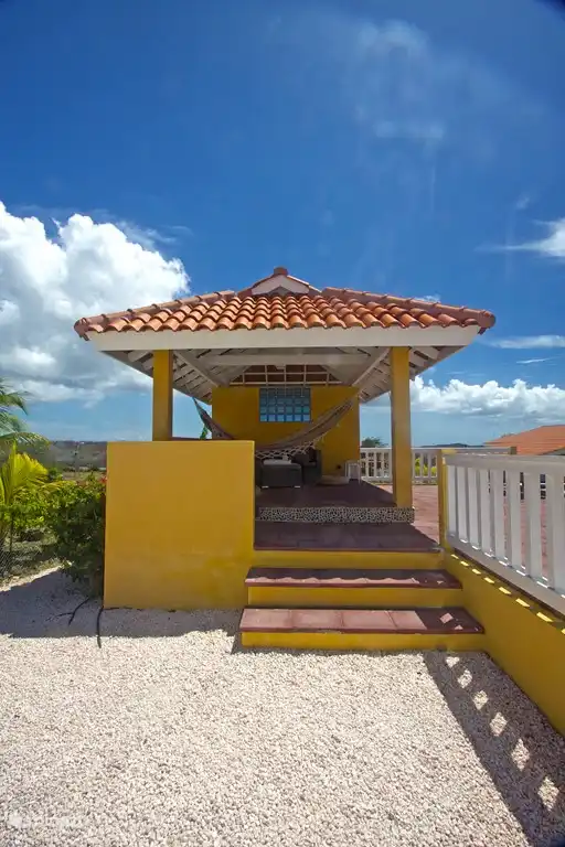 Shady gazebo, well situated on the wind. With lounge and hammock