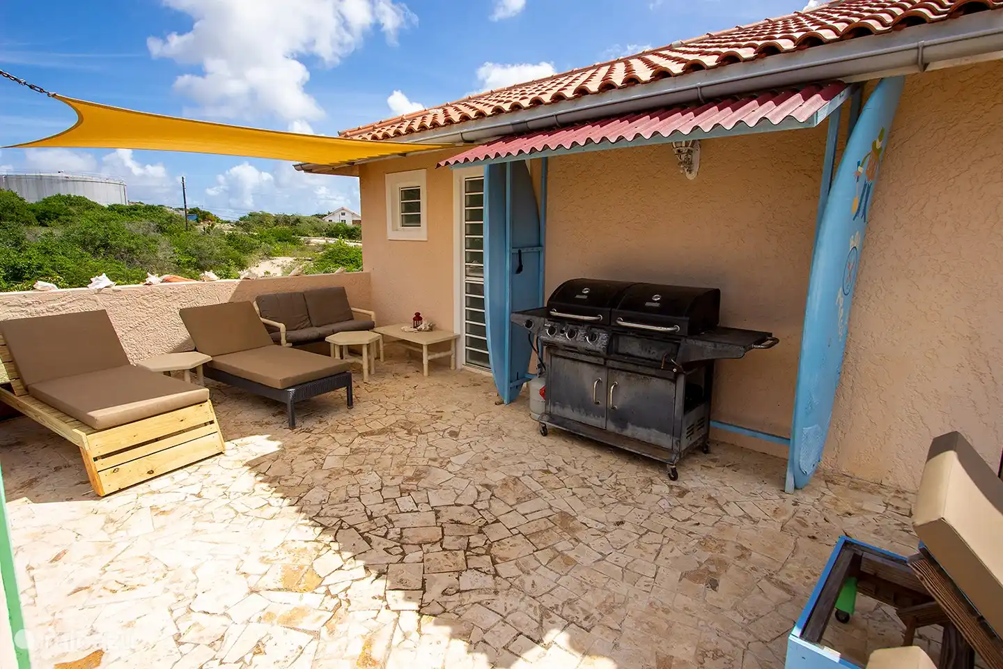 The sun terrace of Casa di Bon Bientu Bonaire with many hours of sunshine. A Gaz / Charcoal BBQ is also present