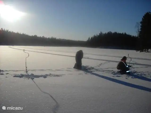 Fishing in the winter. Ice fishing for trout.