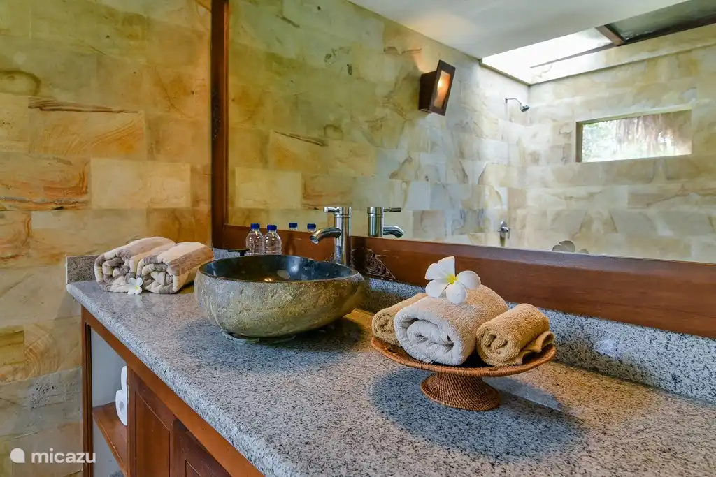 Pool, beach pavilion and the sea