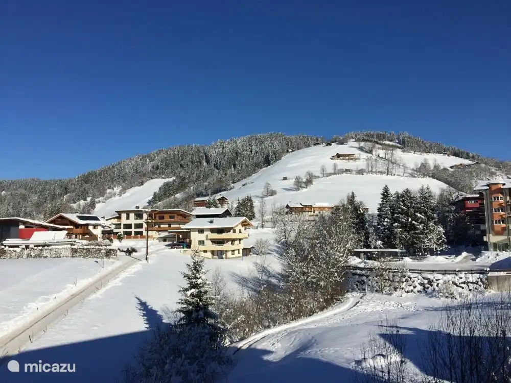 View of the mountain landscape from the apartment in winter.