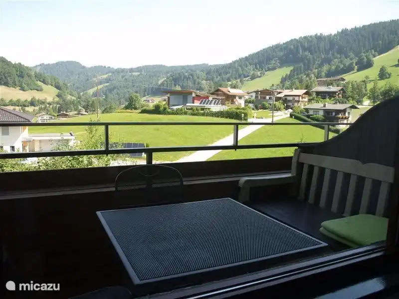 Balcony, with new sofa and table with 2 single seats. Beautiful view over the mountain landscape.