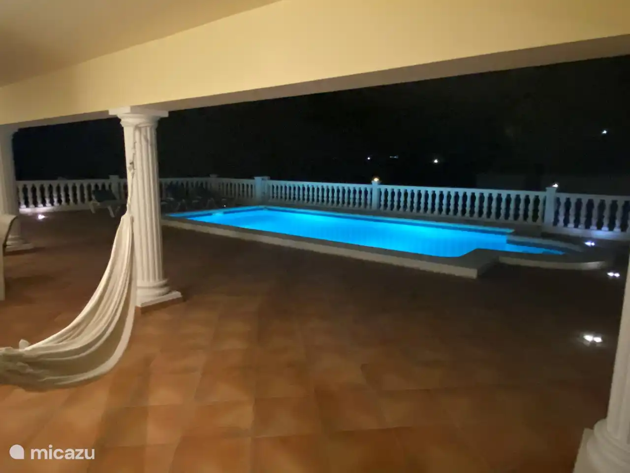 There is pool lighting to take a dip in the evening or relax in the hammock. 