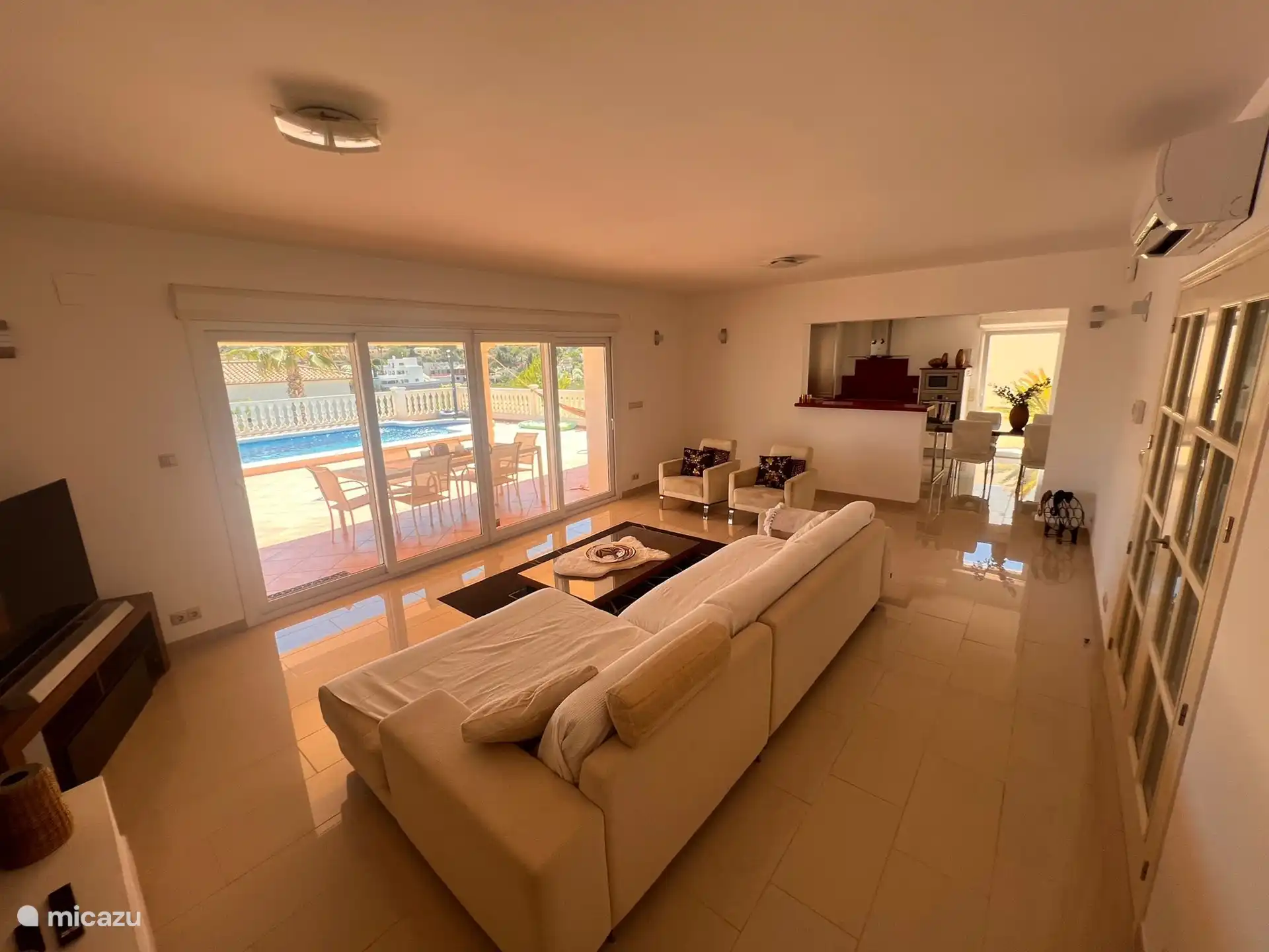 The living room is equipped with air conditioning.