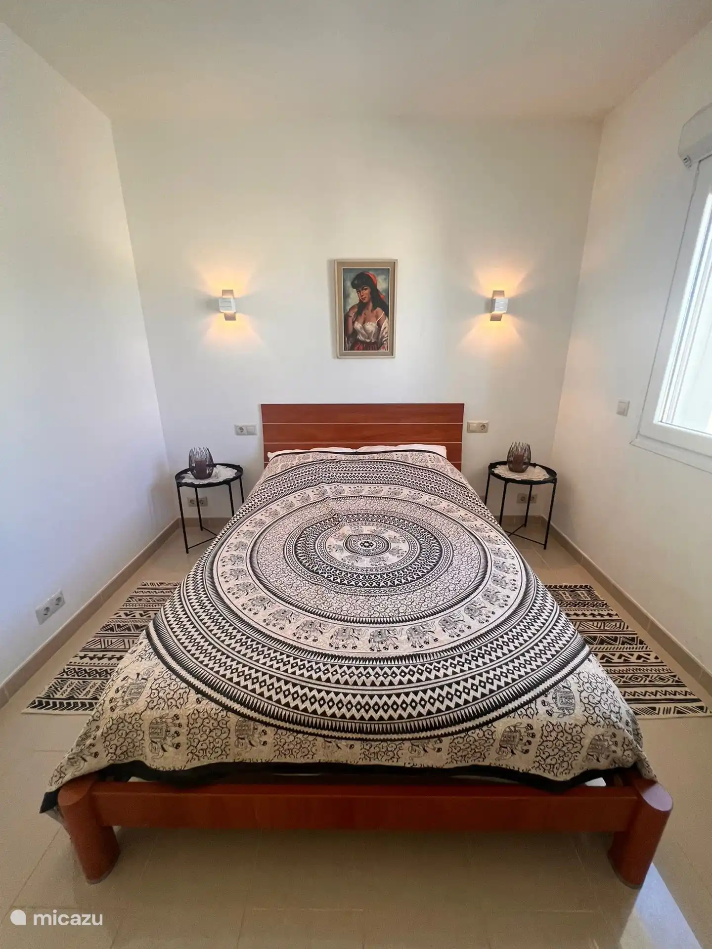 This is one of the bedrooms on the ground floor and has air conditioning. 