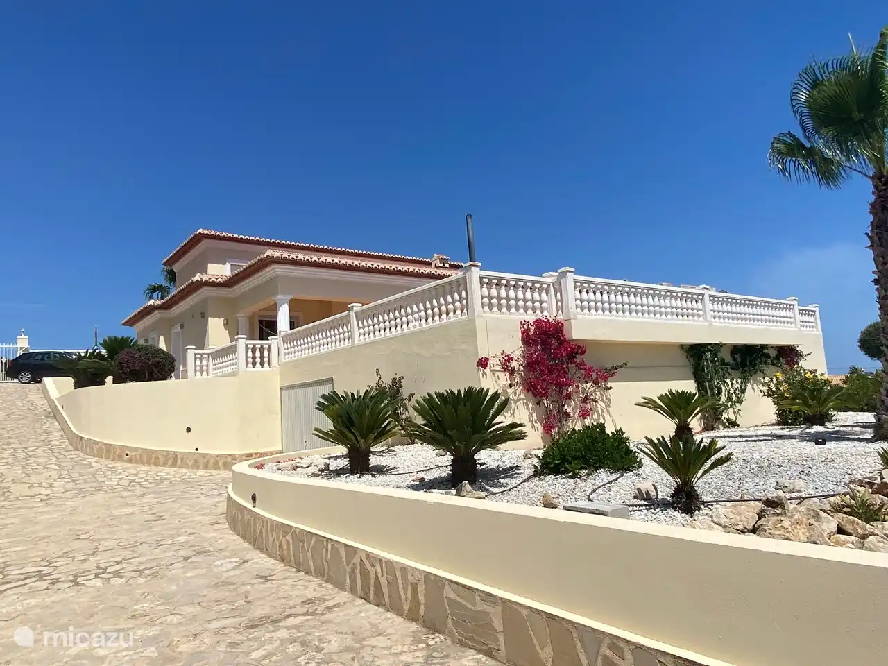 Underneath the house there is a garage with space for about 3 cars.