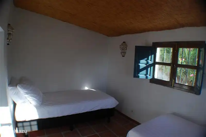 Bedroom apartment with two single beds that can be  put next to each other