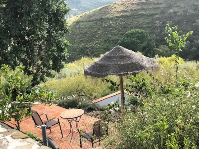 Finca La Estrella de Cómpeta huren in Spanje, Andalusië, Cómpeta - finca Een van de vele terrasjes