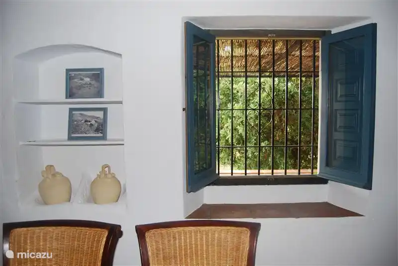 Vieuw on the terrace and left the original troughs of cows