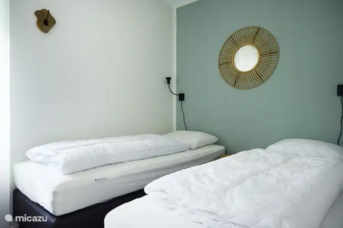 Im Erdgeschoss befindet sich ein Doppelzimmer