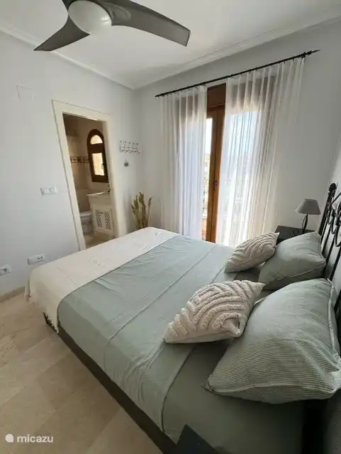 The master bedroom with ensuite bathroom.