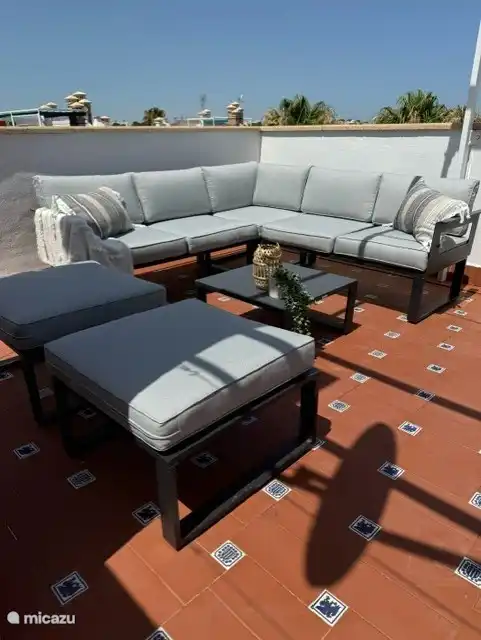 The lounge set with 2 footstools, a wonderful place to relax.