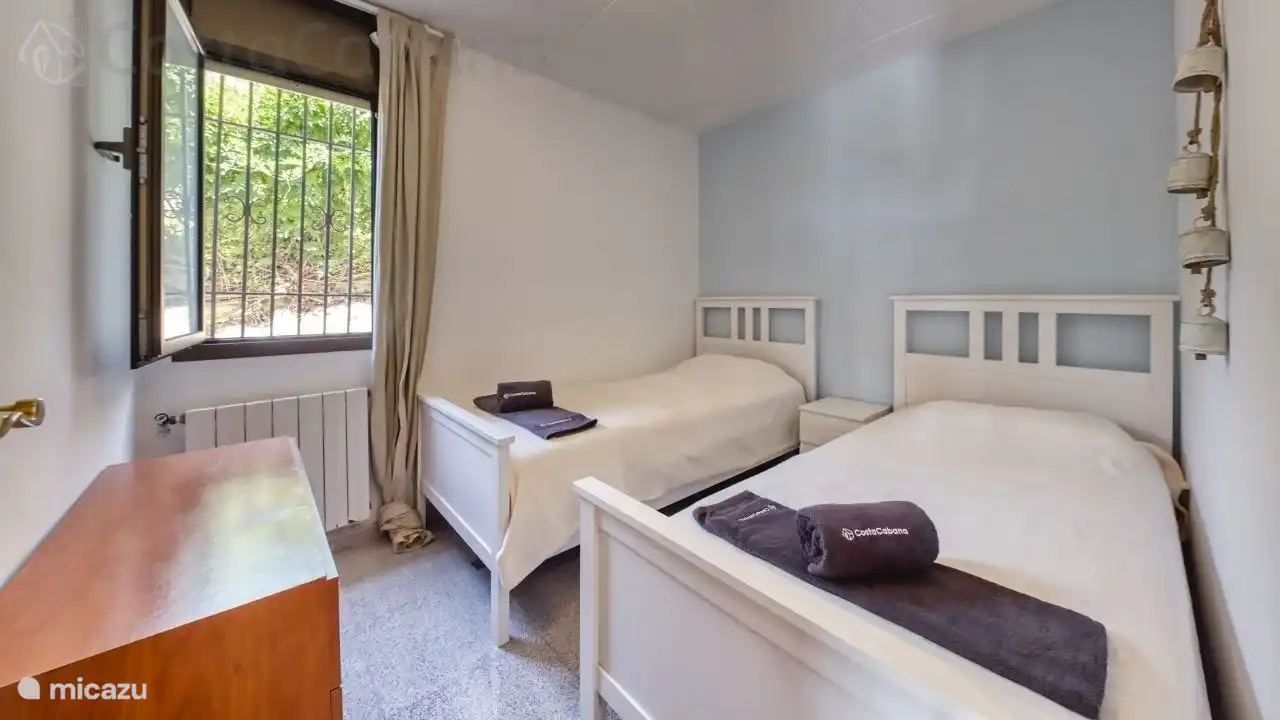 A holiday home with a large garden with private pool, just outside the center of Lloret de Mar!