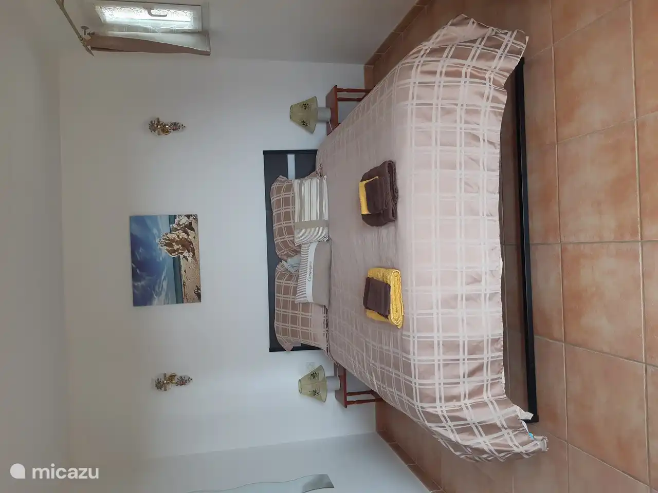 Schlafzimmer im ersten Stock mit Terrasse