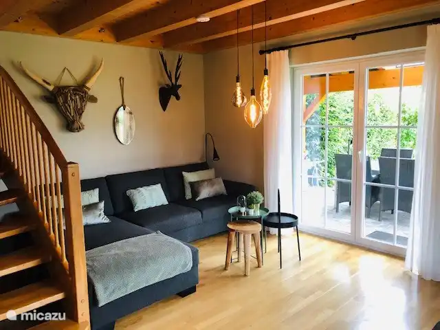 The cozy and spacious, comfortable seating with side pouf offer enough space for 4 to 6 people.