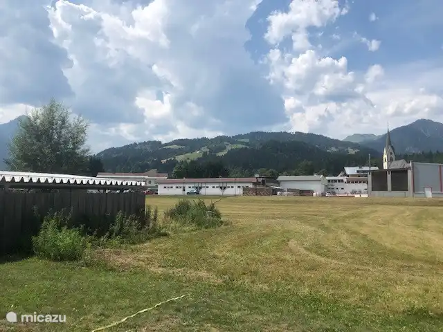 View of the mountains and the beautiful church in the center.