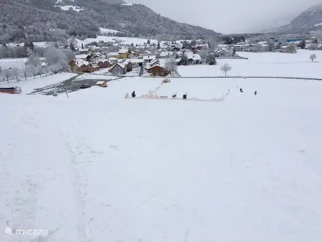 Haus Fingerhut huren in Oostenrijk, Karinthië, Kötschach-Mauthen - vakantiehuis Vanuit de skipiste heb je een directe blik op Haus Fingerhut.