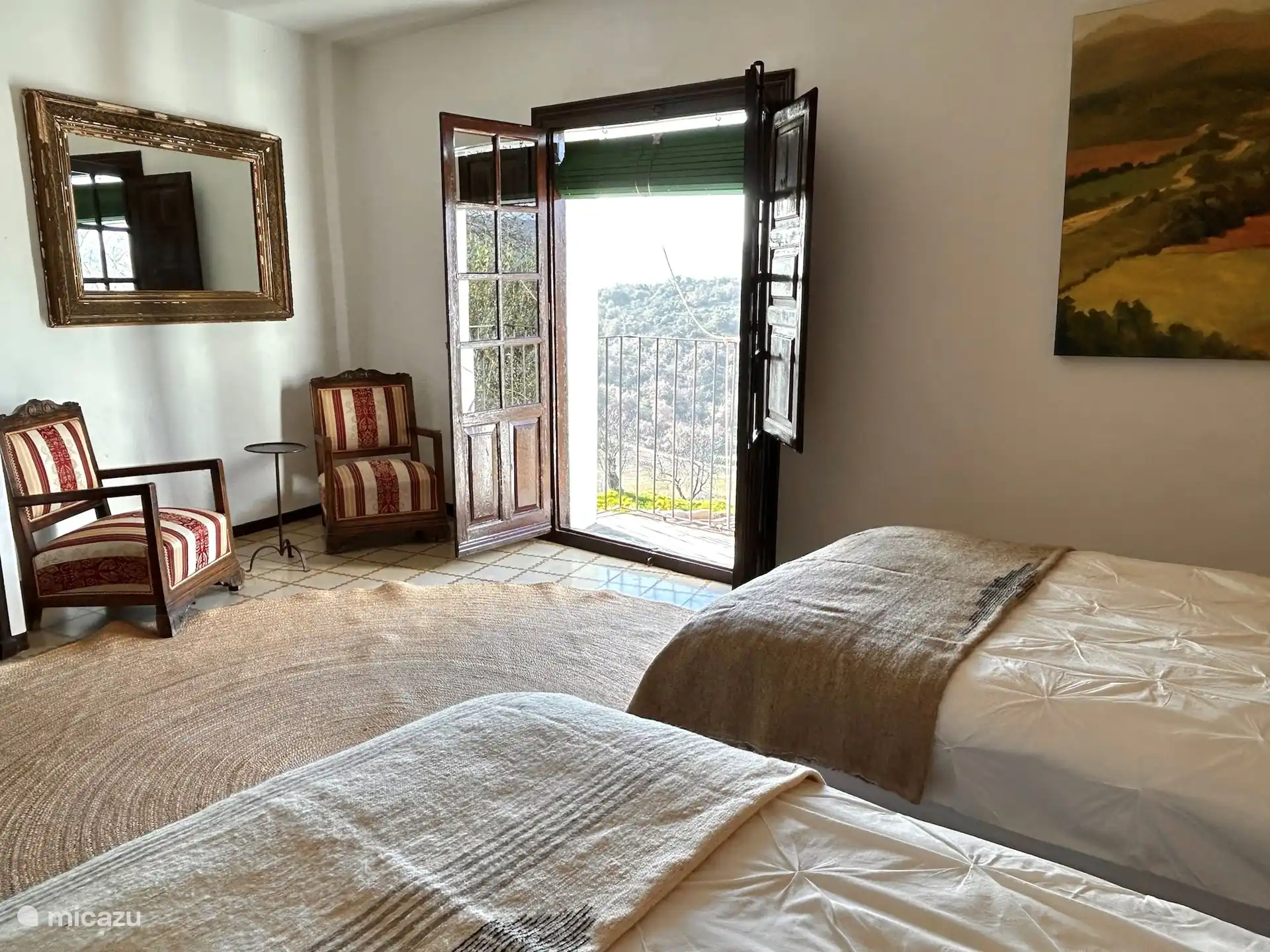 Bedroom 5 also has a balcony.