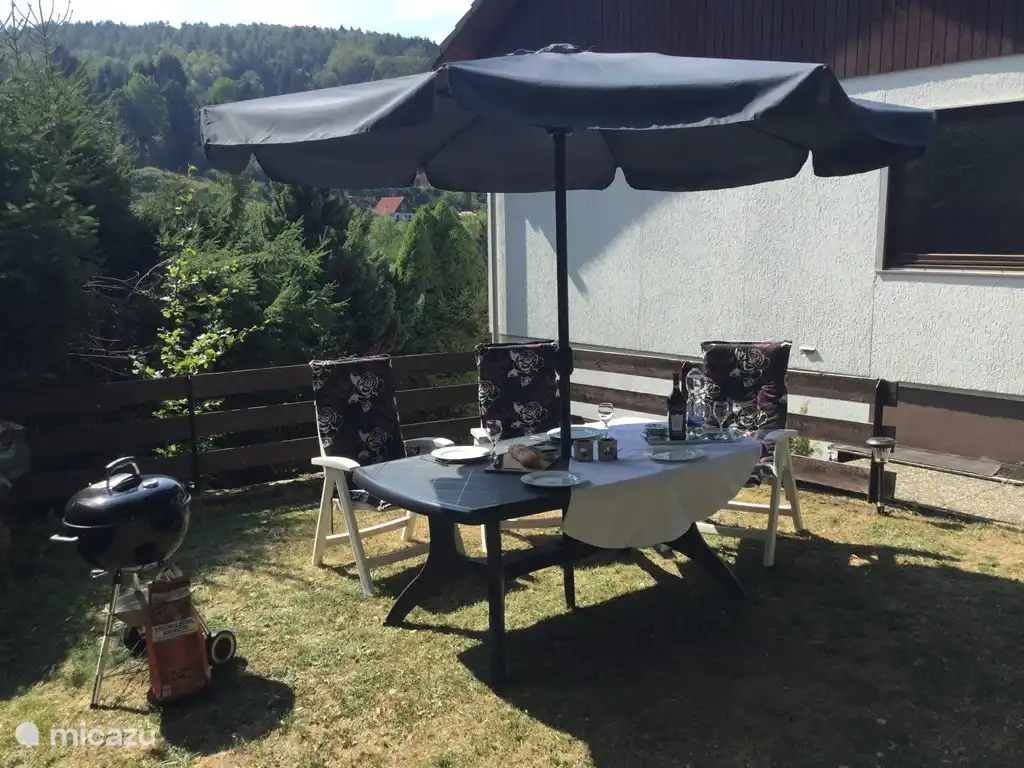Terrace with beautiful views over the valley. Here the barbecue is ready for use.