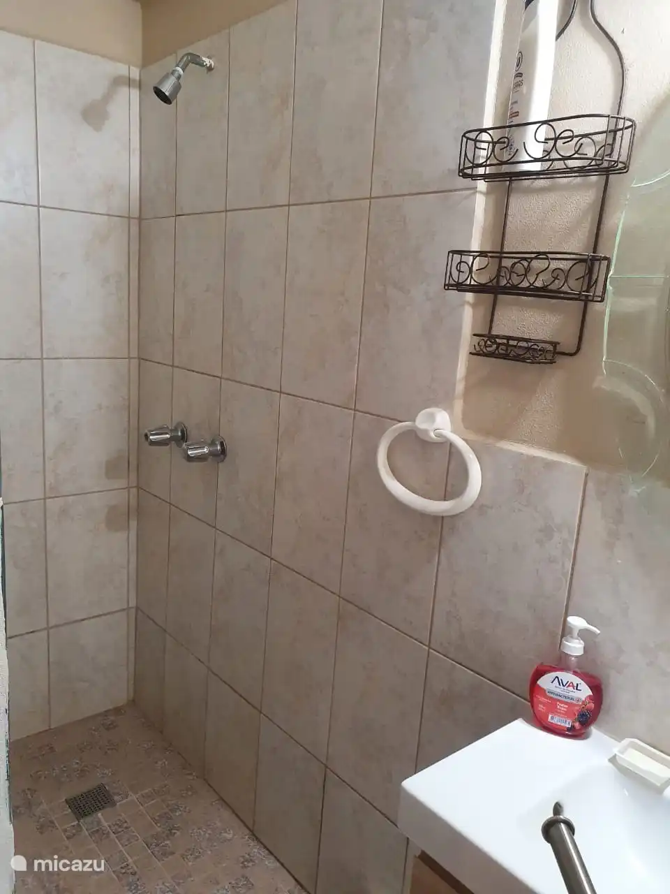 Bathroom with shower (hot water)
Shower area