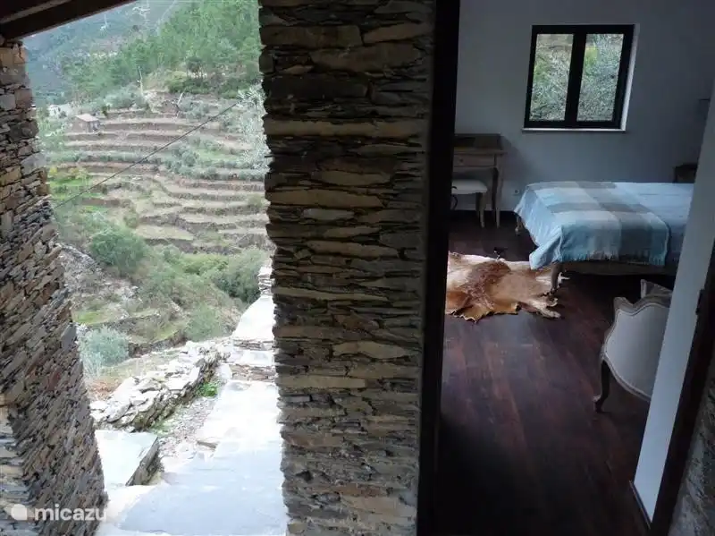 Spacious tastefully furnished ensuite Master bedroom with Kings bed, large window, door to patio and beautiful views.