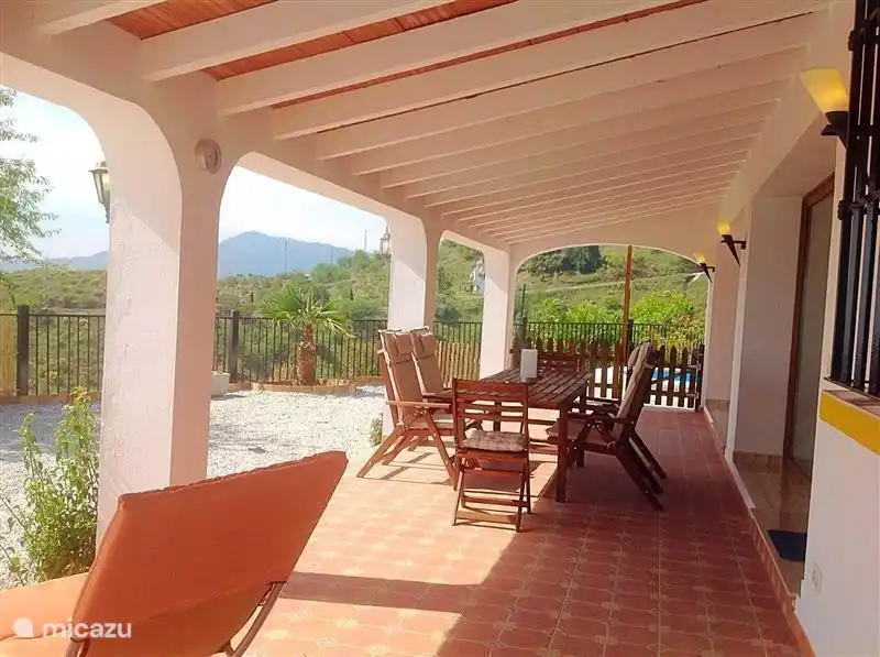 For the whole house along a covered porch with beautiful meubulair.