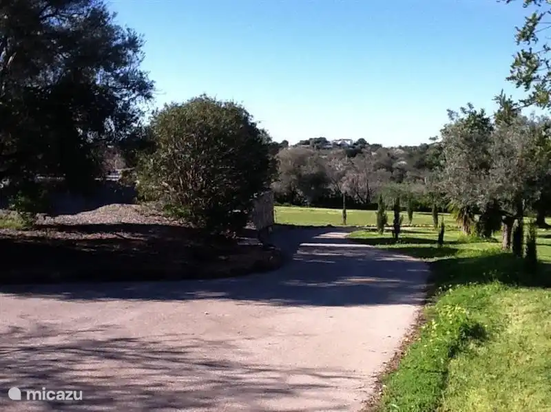 the driveway to the right entrance and left the house.