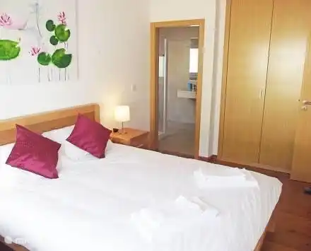 Dormitorio con baño privado