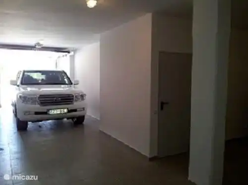 In the private garage has room for two cars.