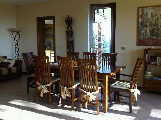 Living room with large dining table.