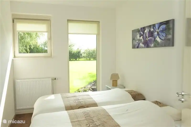 Das Schlafzimmer im Erdgeschoss, das neben dem Bad ist