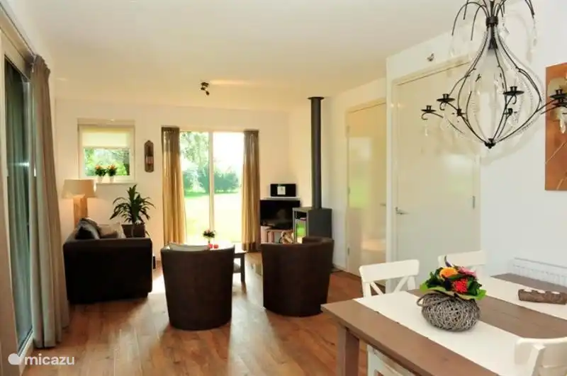 The living room overlooks the large lawn.