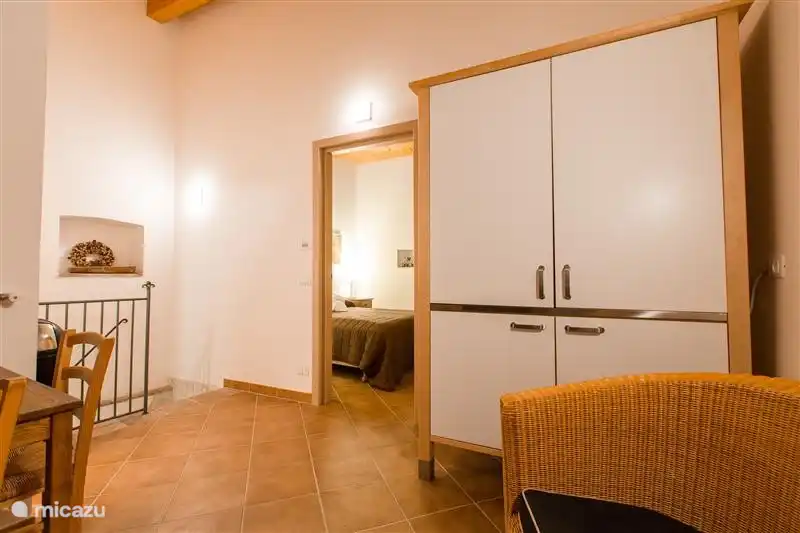 Wohnzimmer mit Essecke, Sitzecke und Küchenzeile